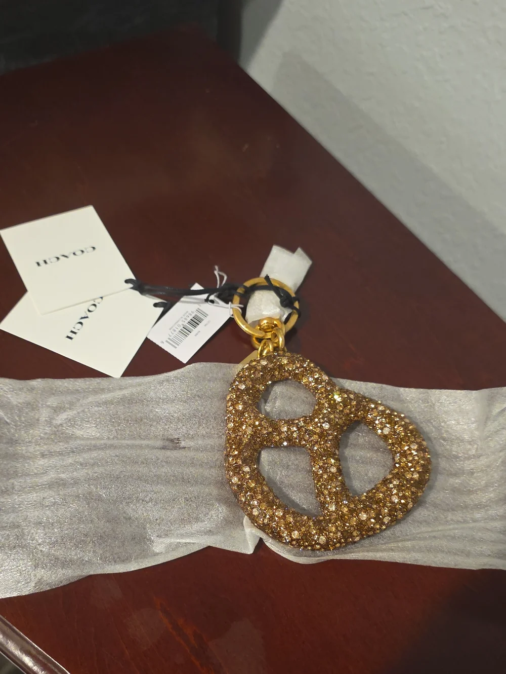 NWT Brass/Brown Coach Crystal Pretzel Bag Charm